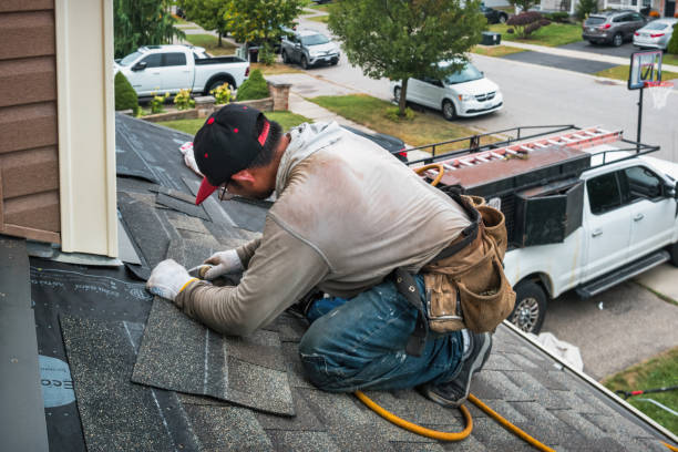 Professional Roof Replacement technician working in Experiment, GA